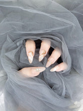 Blushing Whispers: Marble Effect Almond Nails with Shimmer and Subtle Bead Accents Instant Mani