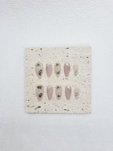 Bloom Serenity: Almond Nails in Matte Nude Pink with gold and Floral Designs