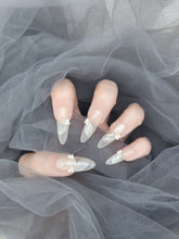 Blooming Pearls: Nude Nails with Floral Designs and Pearl Accents Instant Mani
