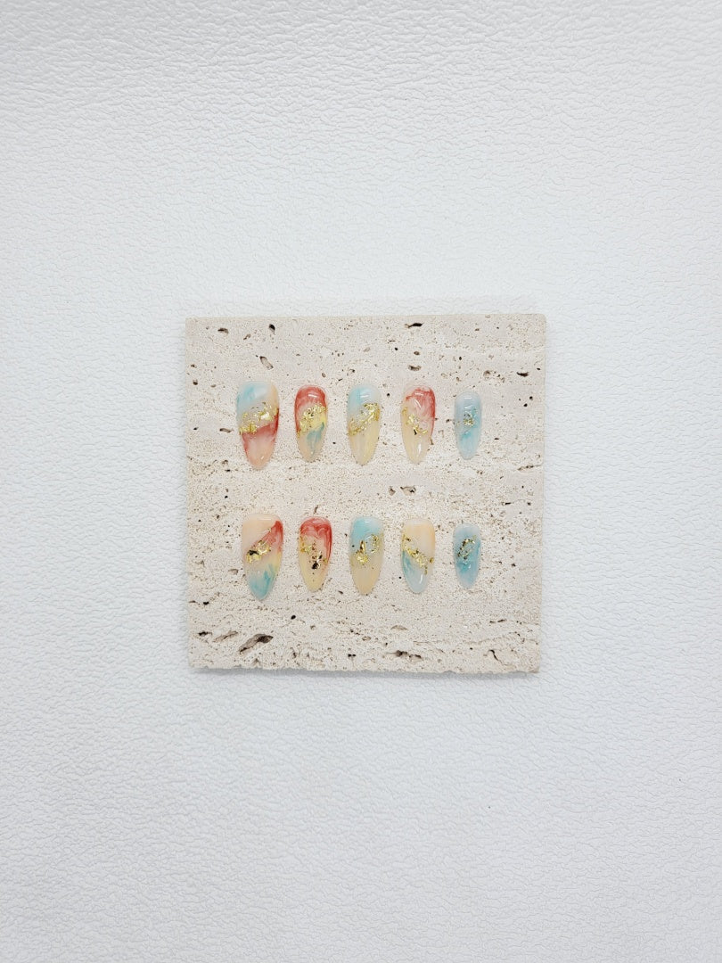 Rippling Aurora: Almond Nails with colours of the Fall and Gilded Flakes