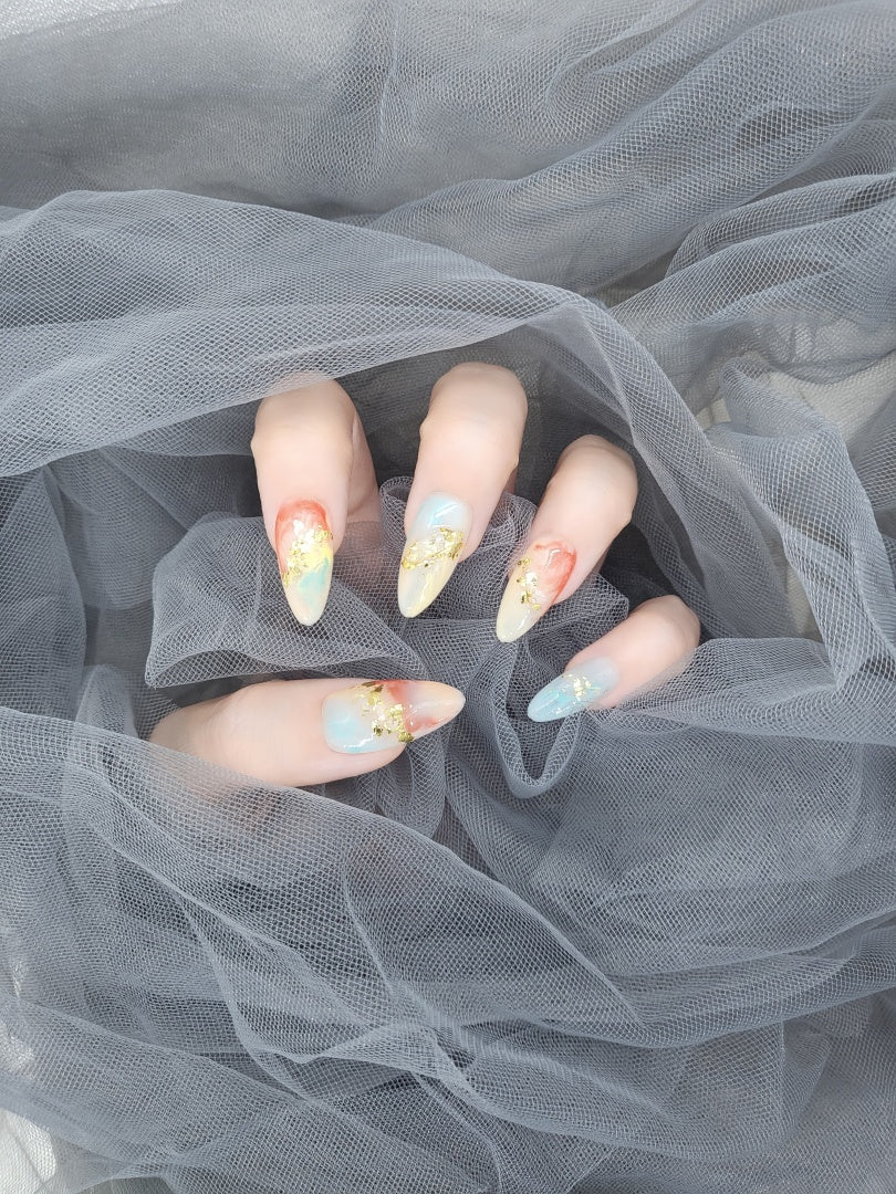 Rippling Aurora: Almond Nails with colours of the Fall and Gilded Flakes