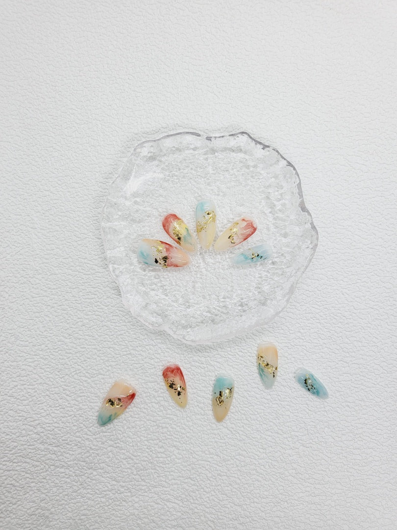 Rippling Aurora: Almond Nails with colours of the Fall and Gilded Flakes